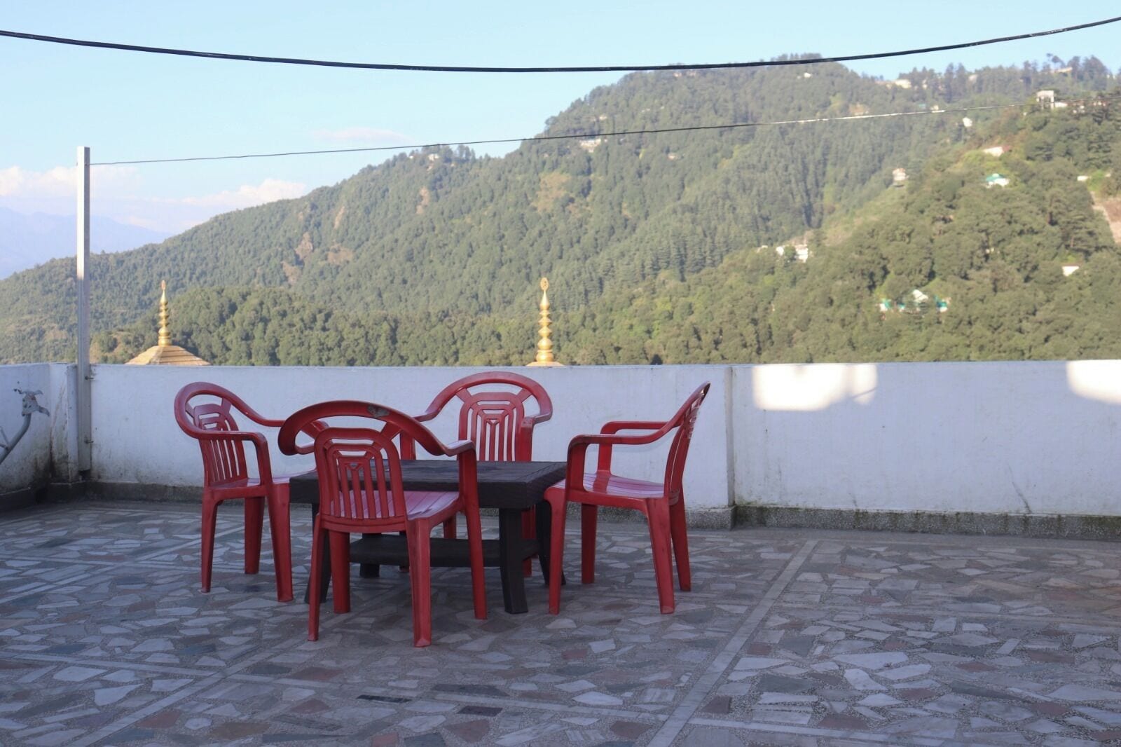 Rooftop terrace tables — Hotel Tourist Home by Palak Hospitality, Mussoorie