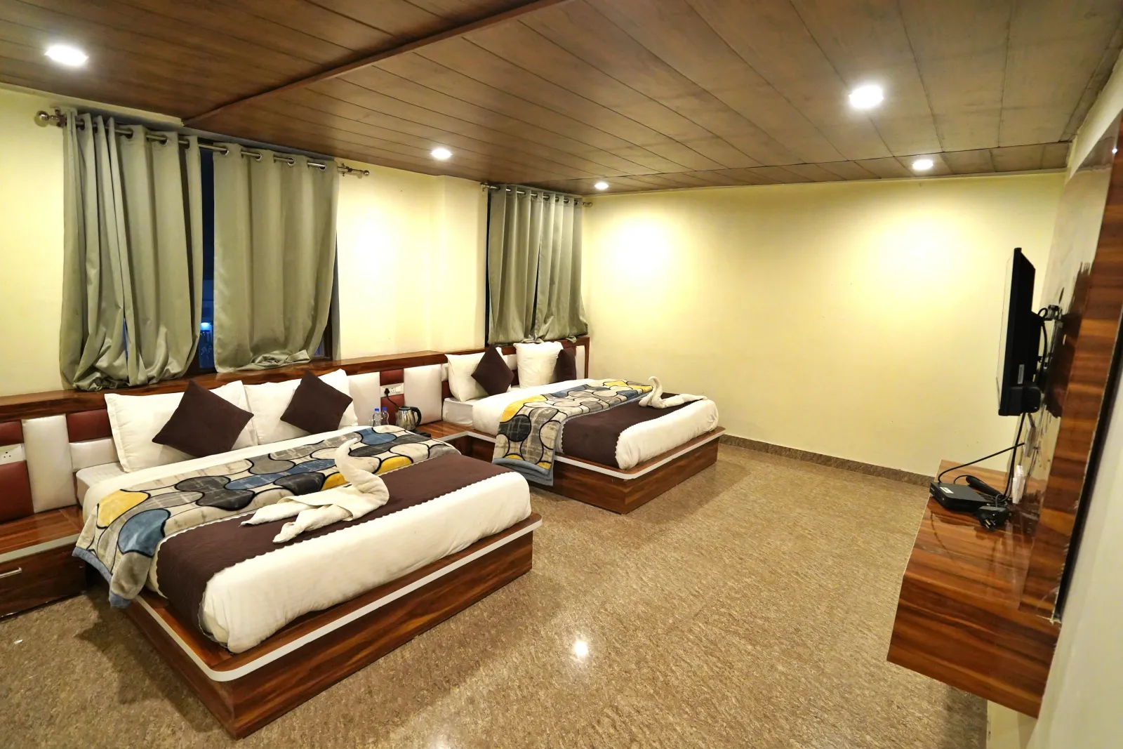 Deluxe room with two beds at Hotel Divine Ganga, Badrinath