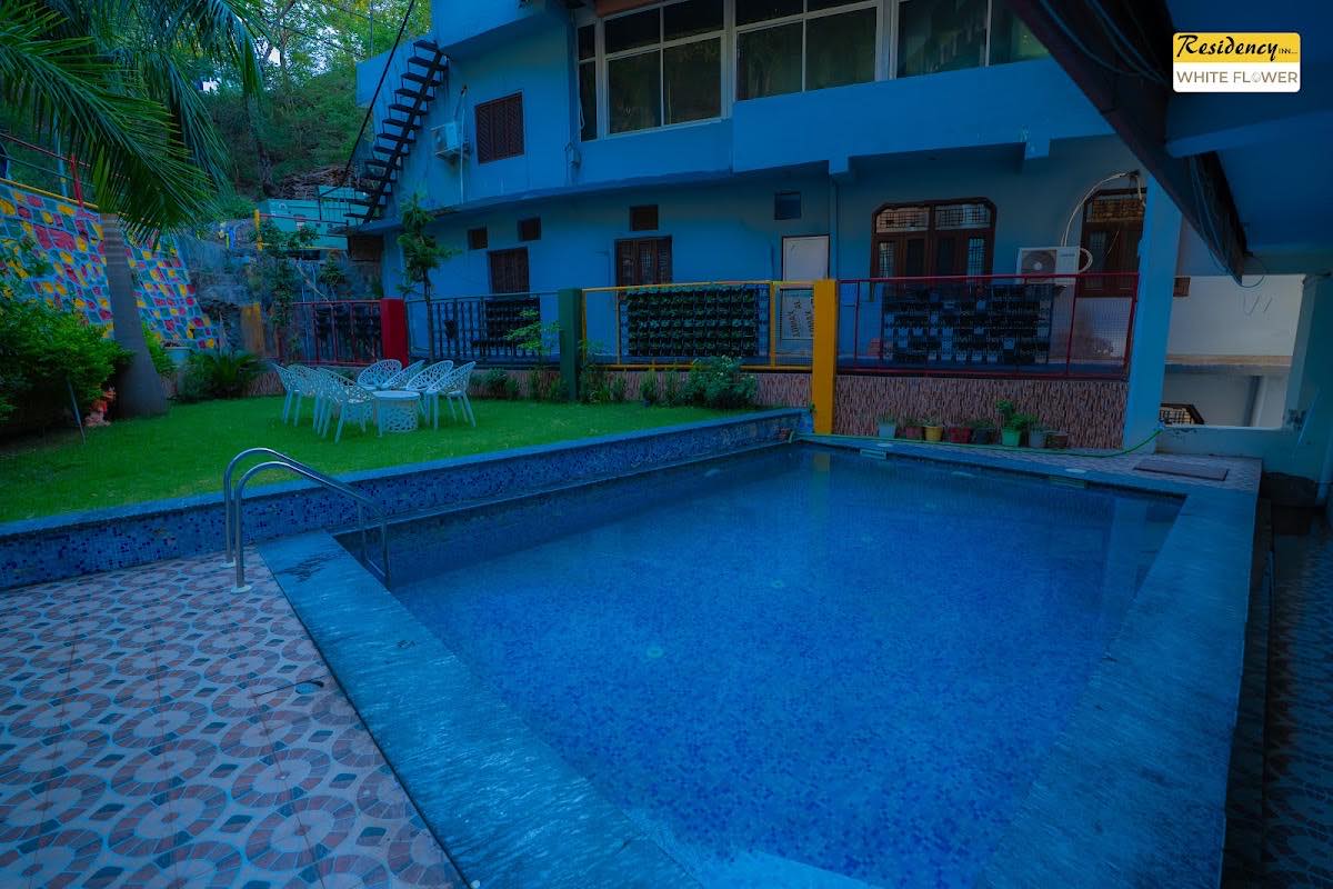 Aroha Residency Inn White Flower